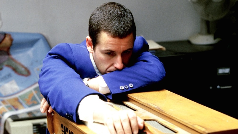 Adam Sandler broods