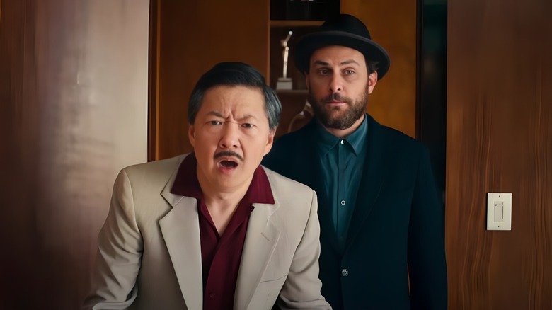 Ken Jeong looking shocked and Charlie Day looking bemused in "Fool's Paradise"