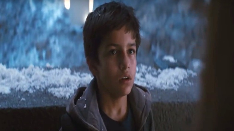 Kid with Apple in The Dark Knight Rises