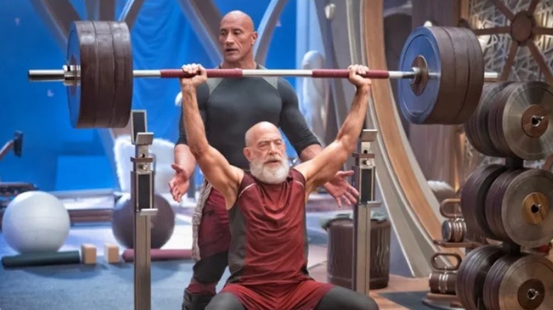 Callum spots as Santa lifts weights in "Red One" (2024)