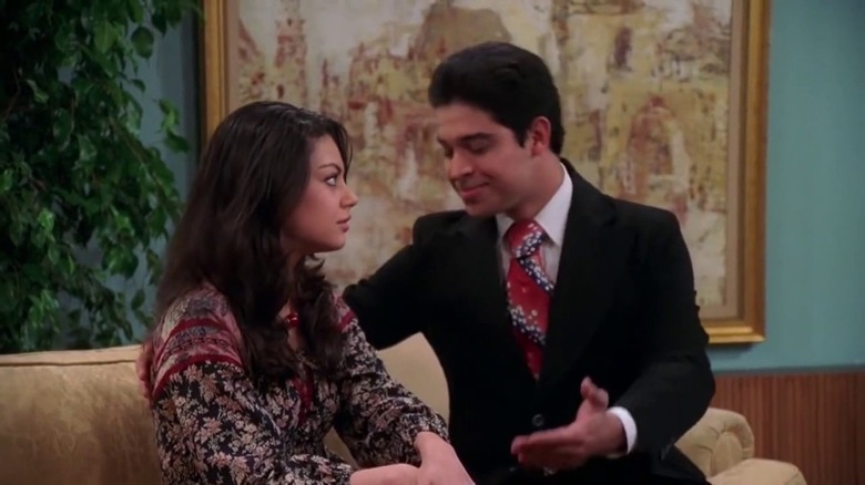 Jackie and Fez talking