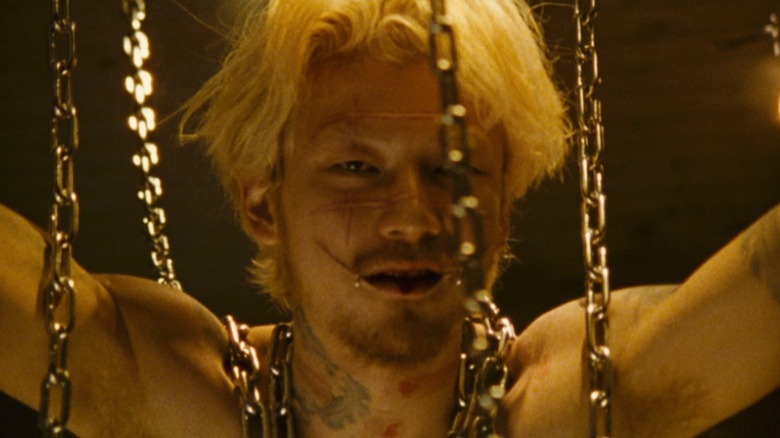 Kakihara bound up in chains