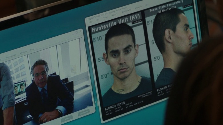 Alonzo Reyes' mugshots appear on a computer screen