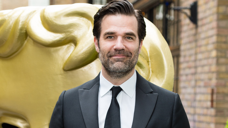 Rob Delaney smiles at awards