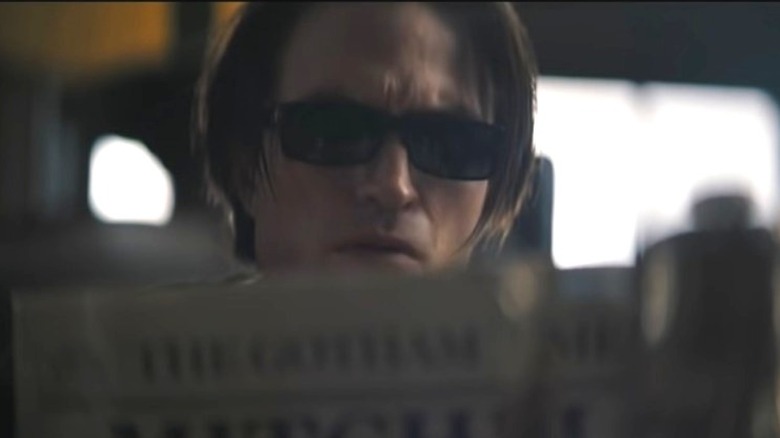 Bruce Wayne reading the newspaper in "The Batman"