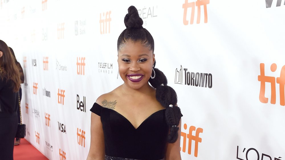 Dominique Fishback attends the The Hate U Give premiere in 2018