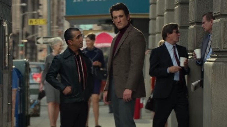 Miles Teller wearing a 70s suit as Albert Ruddy