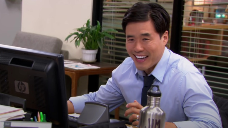 Asian Jim at desk