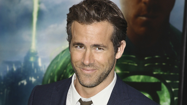 Ryan Reynolds smirking at Green Lantern premiere