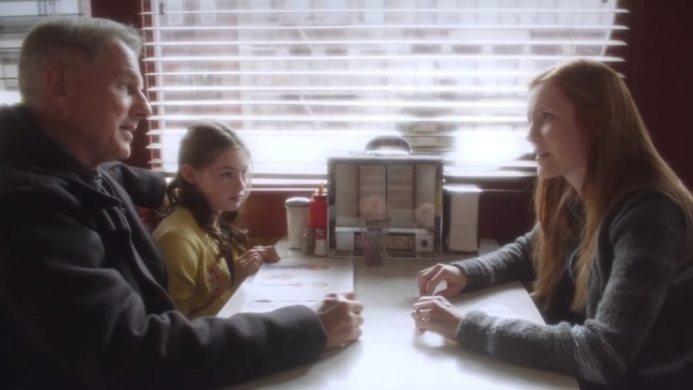 The Gibbs family in a diner booth