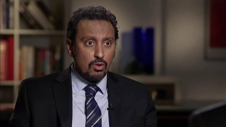 Aasif Mandvi interviewing on The Daily Show