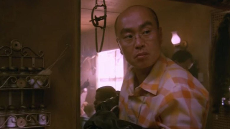 Lee as Vince Masuko in flannel shirt