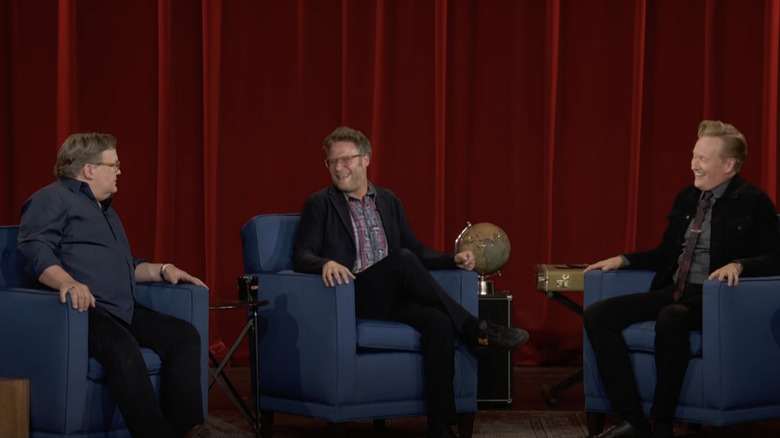 Seth Rogen, Andy Richter, and Conan O'Brien on stage