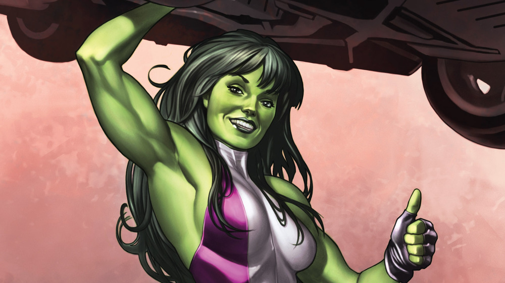 She Hulk lifting a car while giving thumbs up