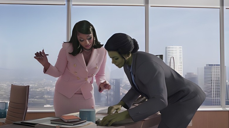 Megan signing paperwork with She-Hulk