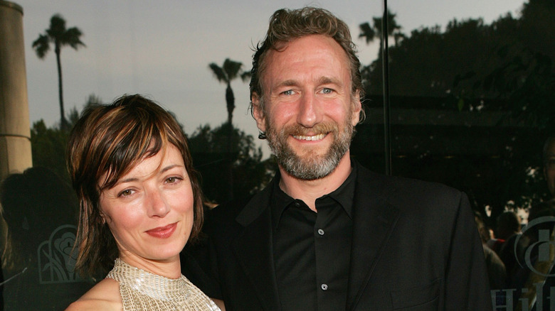 Mia Sara and Brian Henson posing together