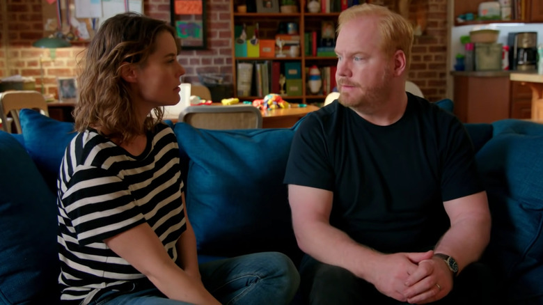 Jeannie and Jim Gaffigan sitting on couch