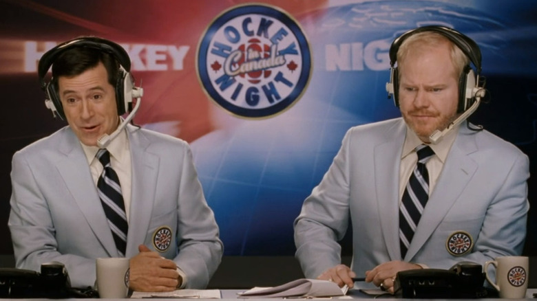 Jay Kell and Trent Lueders sitting behind desk