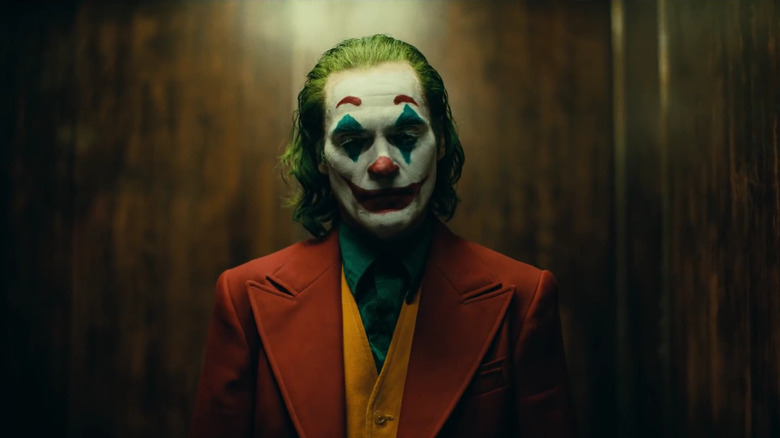 Joker standing in elevator