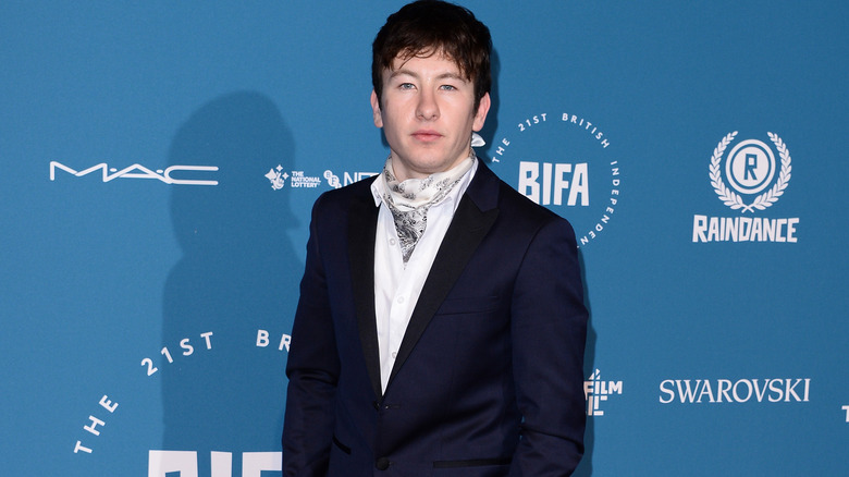 Keoghan attends event 