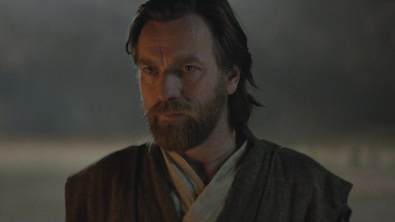 Obi-Wan looking forward intently