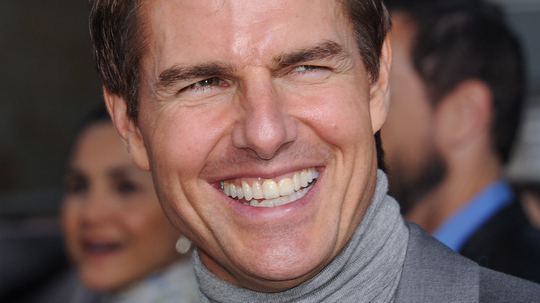 Tom Cruise grinning