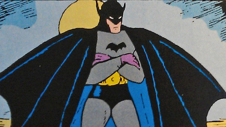 The Bat-Man standing with arms folded