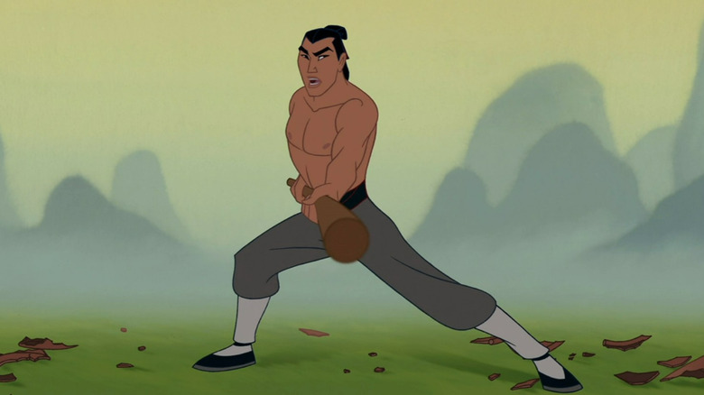 Li Shang wielding a staff