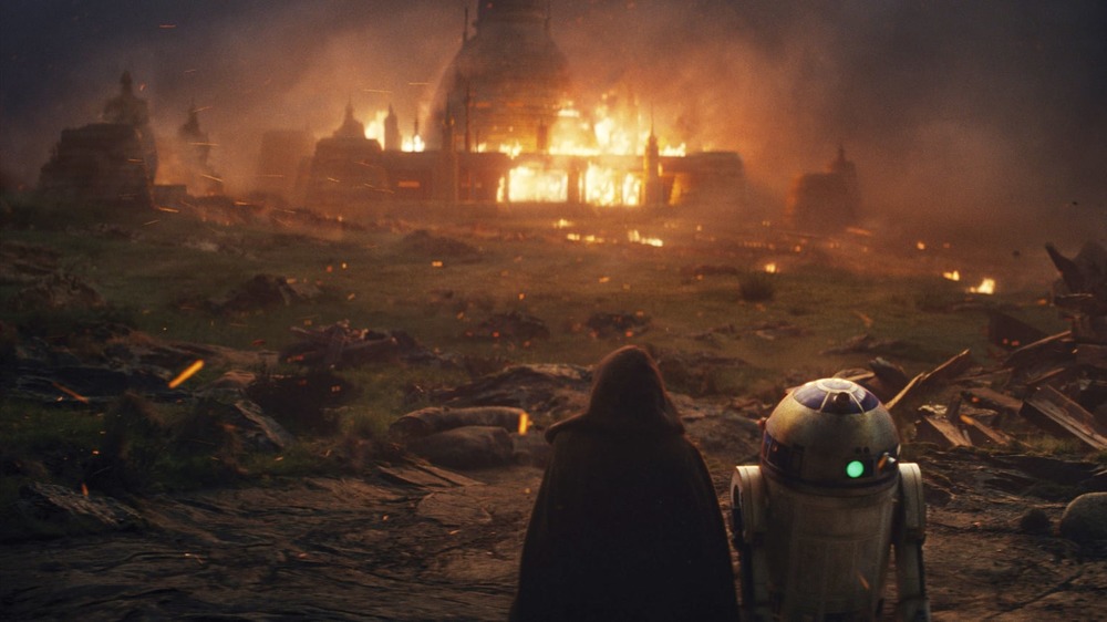 Luke Skywalker and R2-D2 watch Jedi temple burn on Ahch-To