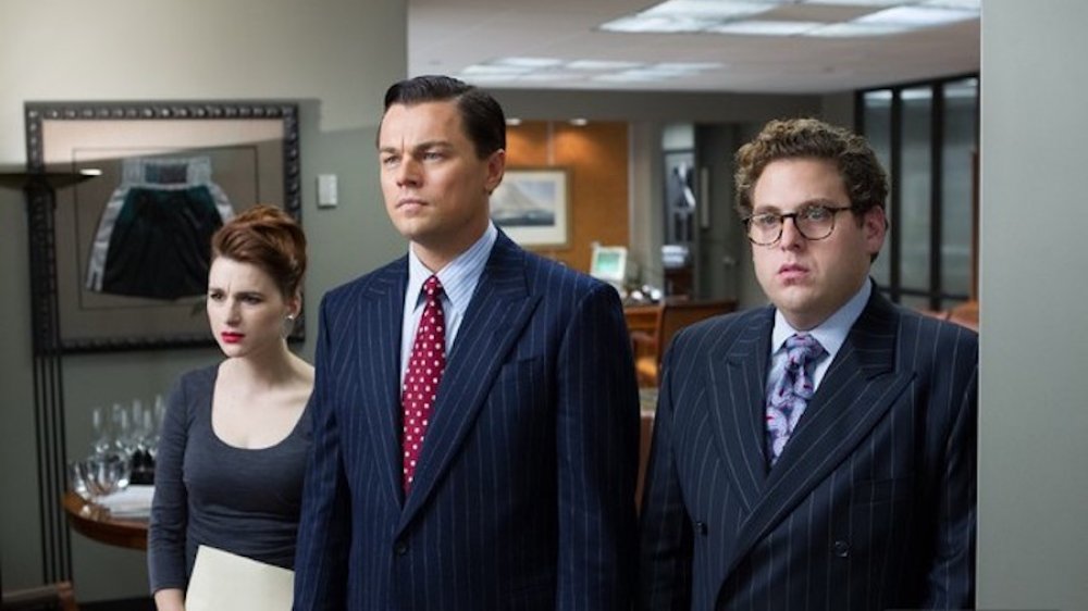 Aya Cash, Leonardo DiCaprio, and Jonah Hill in The Wolf of Wall Street