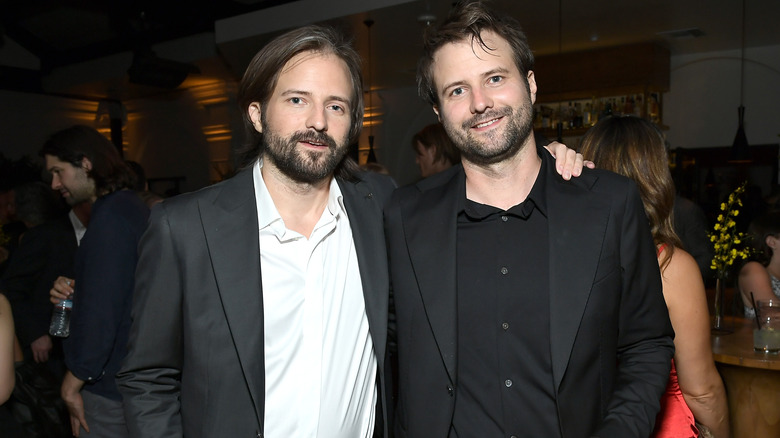 The Duffer brothers smiling for the camera