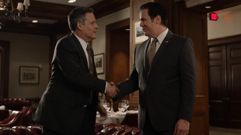 Dan McGinty shakes Mike Quinn's hand in "Lilly"