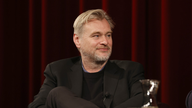 Christopher Nolan sitting