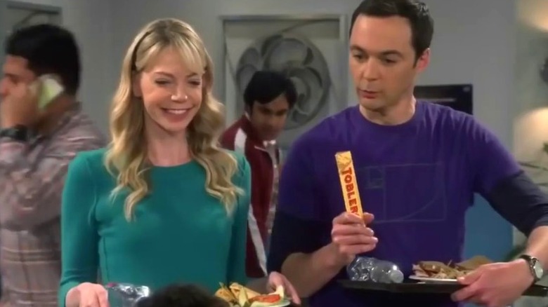 Ramona and Sheldon holding trays