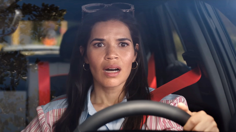 Ferrera driving looking shocked