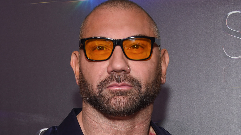 Dave Bautista wearing orange glasses