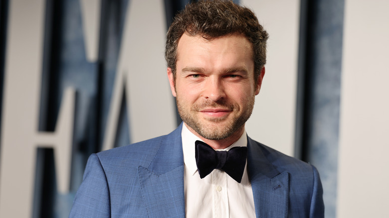 Alden Ehrenreich smiles