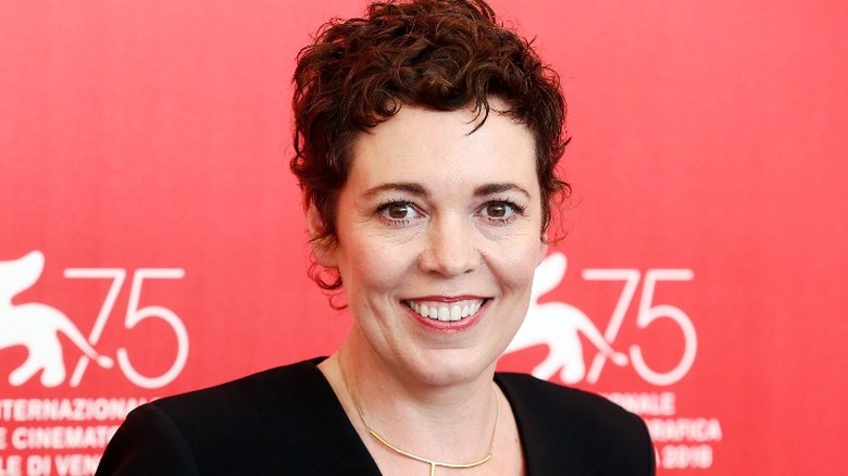 Olivia Colman smiling at a photocall