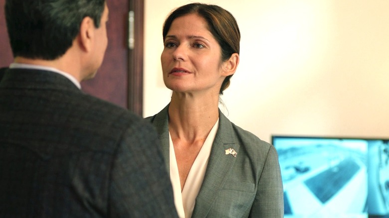 Jill Hennessy wearing suit