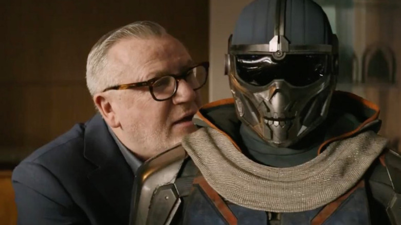 Dreykov whispering to Taskmaster