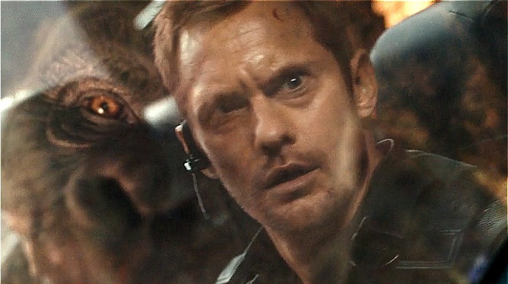 Alexander Skarsgard looking through HEAV window