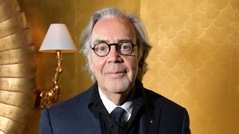 Howard Shore wearing dark suit