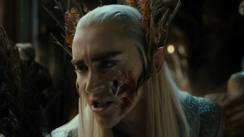 Thranduil showing scarred face