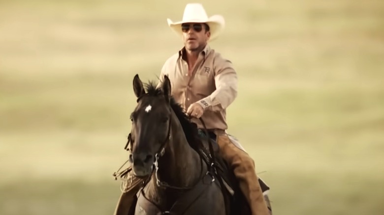 Taylor Sheridan riding a horse