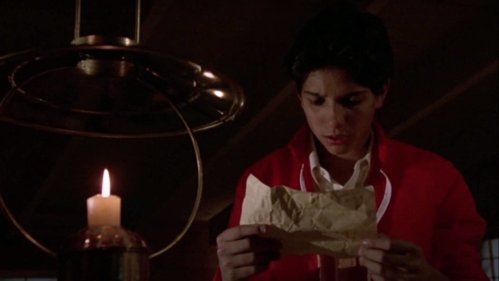 Daniel LaRusso reading a letter