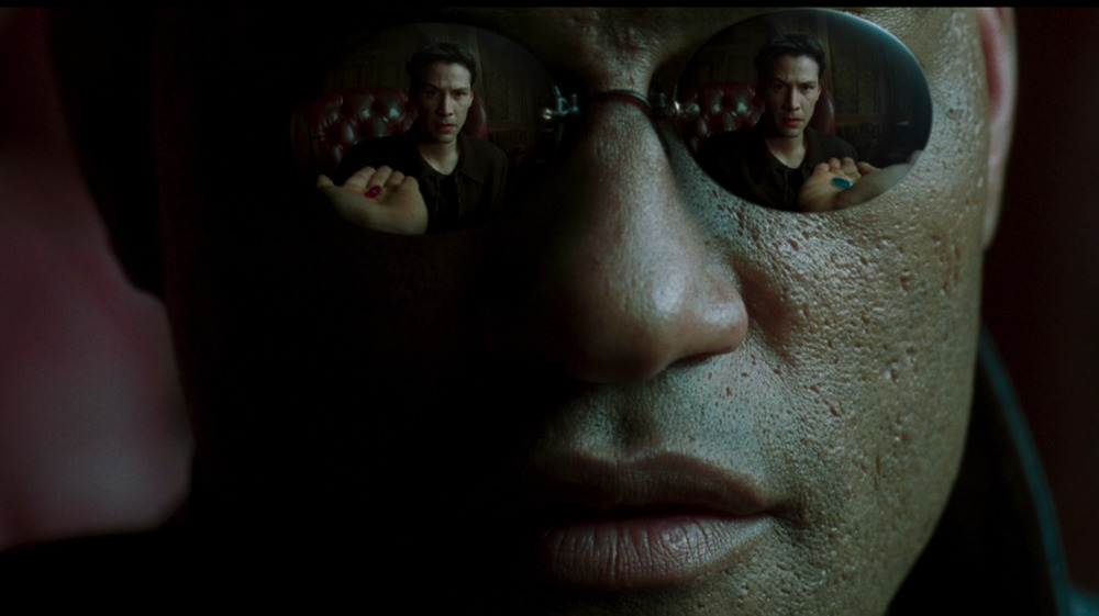 Neo's choice between the red pill and the blue pill is reflected in Morpheus' sunglasses