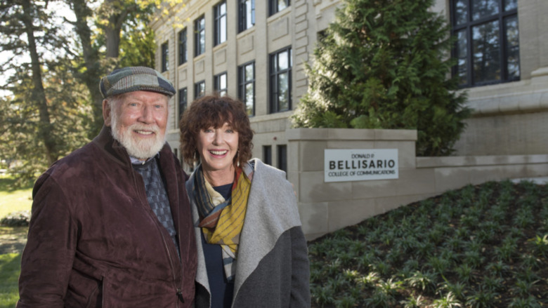 Belisario and wife Vivienne outside Penn State University