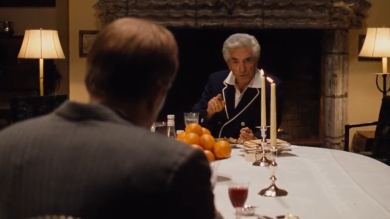 Jack Woltz talks to Tom Hagen over dinner