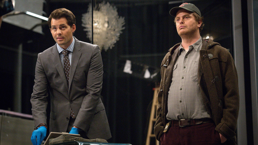 Rainn Wilson and Kristoffer Polaha in Backstrom (2015)