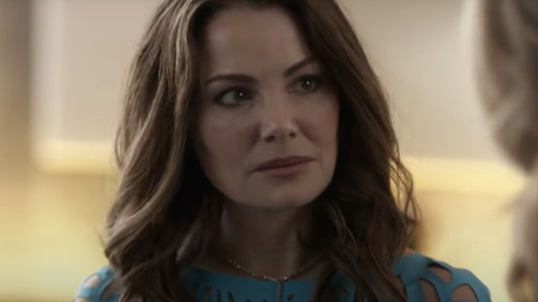 Erica Durance as Alura facing forward